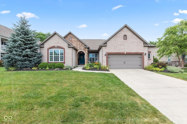 13816 Ambria Dr, Mccordsville, IN 46055 - view of front of house featuring brick siding, driveway, an attached garage, and a front lawn