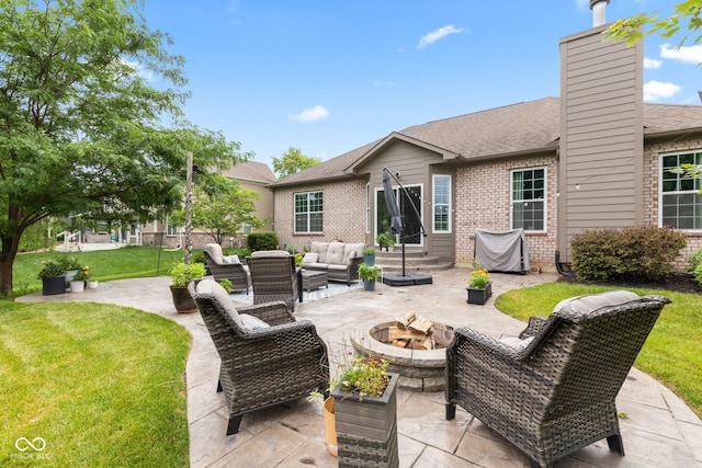 13816 Ambria Dr, Mccordsville, IN 46055 - view of patio with an outdoor living space with a fire pit