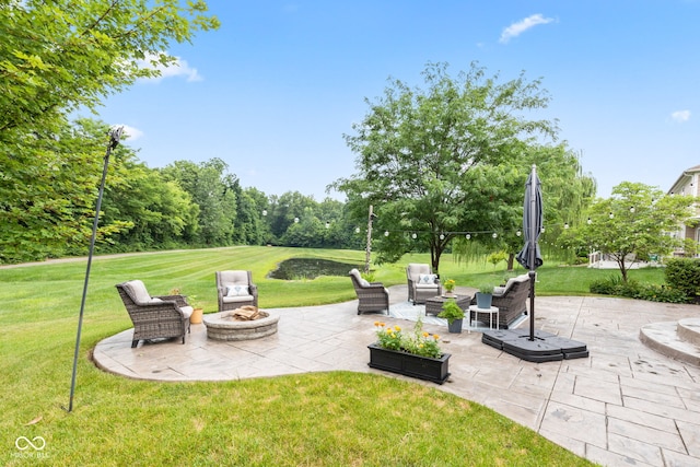13816 Ambria Dr, Mccordsville, IN 46055 - view of patio / terrace with an outdoor living space with a fire pit