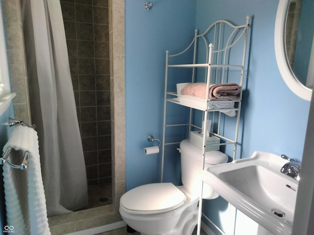 4008 Washington St, Columbus, IN 47203 - full bathroom featuring a shower stall and toilet