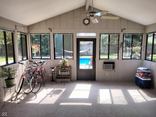 4008 Washington St, Columbus, IN 47203 - sunroom featuring vaulted ceiling, carpet flooring, plenty of natural light, and ceiling fan