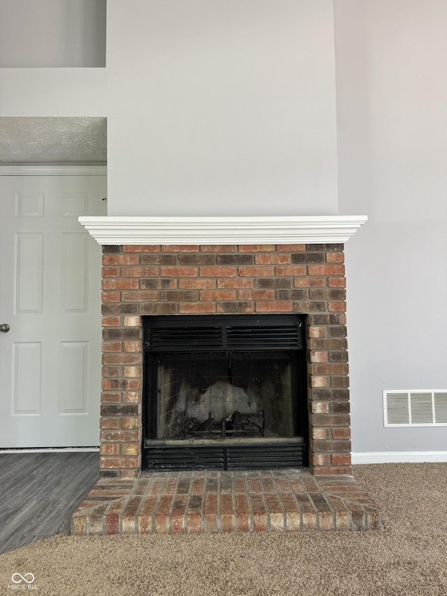 9716 Spruce Ln, Fishers, IN 46038 - detailed view of a brick fireplace and baseboards