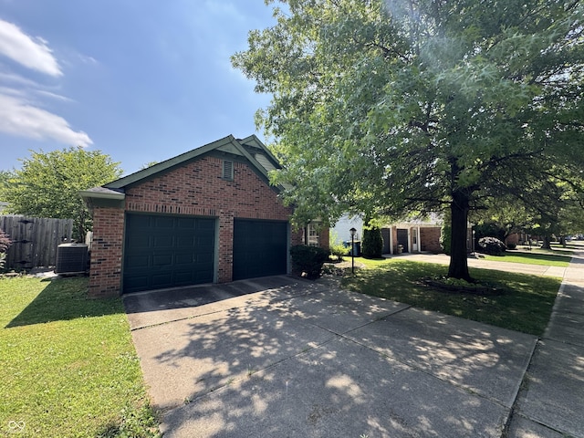 9716 Spruce Ln, Fishers, IN 46038 - view of front facade with brick siding, an attached garage, and driveway