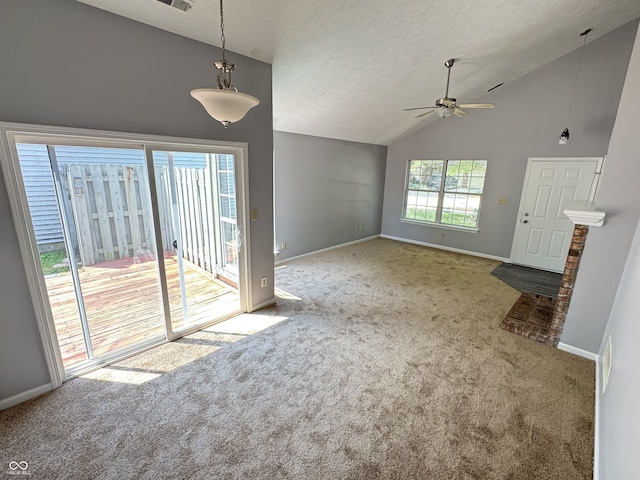 9716 Spruce Ln, Fishers, IN 46038 - unfurnished living room featuring carpet floors, a ceiling fan, a textured ceiling, and high vaulted ceiling