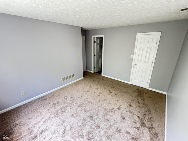 9716 Spruce Ln, Fishers, IN 46038 - unfurnished room featuring carpet floors and a textured ceiling