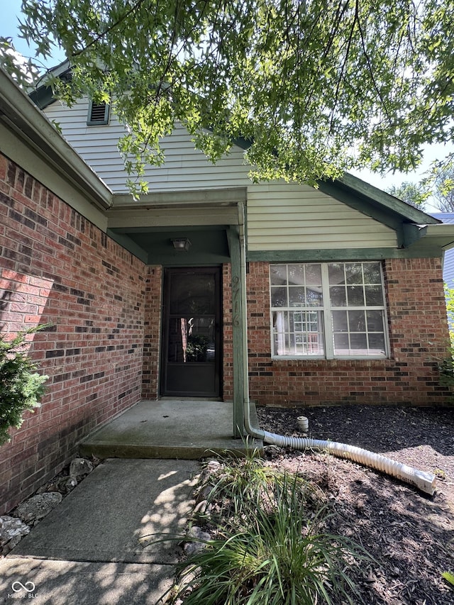 9716 Spruce Ln, Fishers, IN 46038 - property entrance featuring brick siding