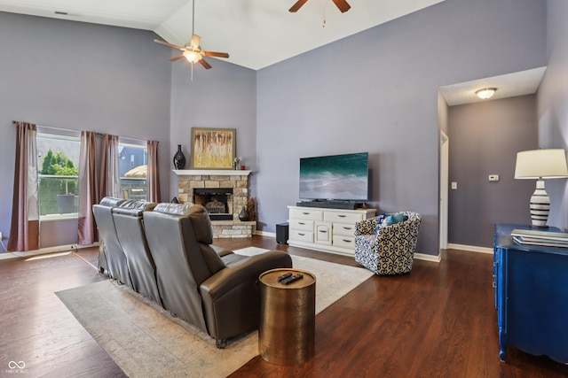 897 Sommersweet Run, Greenwood, IN 46143 - living room featuring ceiling fan, a stone fireplace, wood finished floors, and high vaulted ceiling