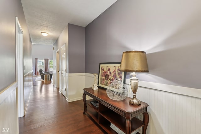 897 Sommersweet Run, Greenwood, IN 46143 - corridor with wood finished floors, wainscoting, and a textured ceiling