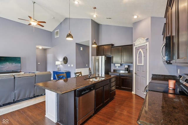 897 Sommersweet Run, Greenwood, IN 46143 - kitchen with stainless steel appliances, dark countertops, high vaulted ceiling, ceiling fan, and dark wood-style flooring