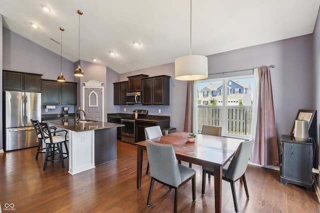 897 Sommersweet Run, Greenwood, IN 46143 - dining space with dark wood finished floors and high vaulted ceiling