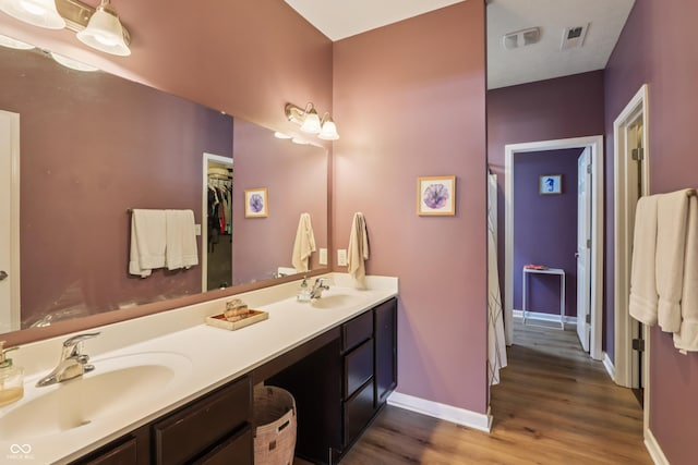 897 Sommersweet Run, Greenwood, IN 46143 - full bath featuring double vanity, wood finished floors, and a spacious closet