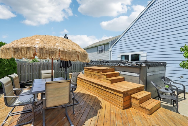 897 Sommersweet Run, Greenwood, IN 46143 - wooden deck with a hot tub and outdoor dining space