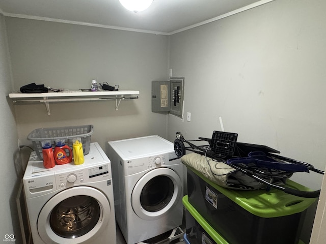 4006 Kenneth Ave, Indianapolis, IN 46226 - laundry room featuring washing machine and dryer, electric panel, and ornamental molding