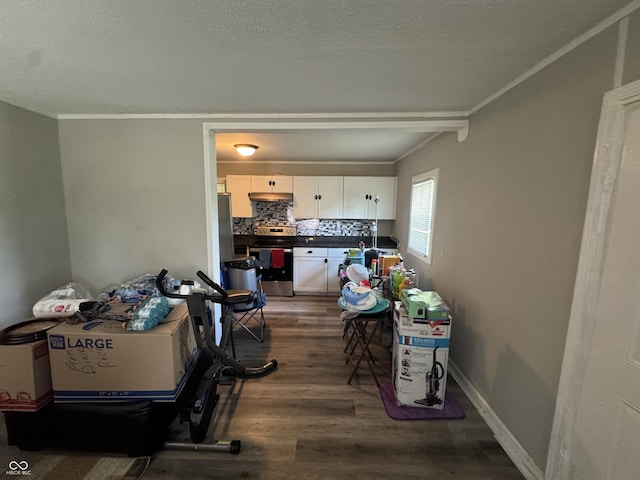 4006 Kenneth Ave, Indianapolis, IN 46226 - dining space featuring dark wood-style floors and a textured ceiling