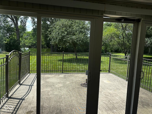 321 S Locust Dr, Morristown, IN 46161 - doorway featuring view of wooded area and plenty of natural light