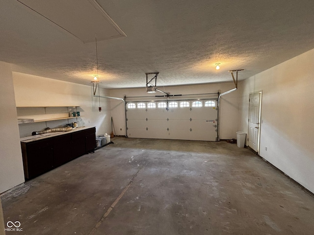 321 S Locust Dr, Morristown, IN 46161 - garage featuring a garage door opener