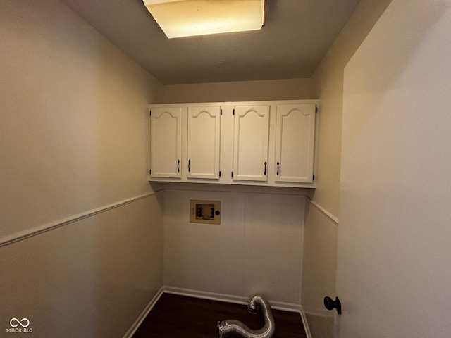 321 S Locust Dr, Morristown, IN 46161 - washroom featuring cabinet space, washer hookup, and dark wood finished floors