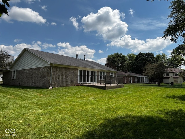 321 S Locust Dr, Morristown, IN 46161 - back of house with brick siding, a yard, and a patio area