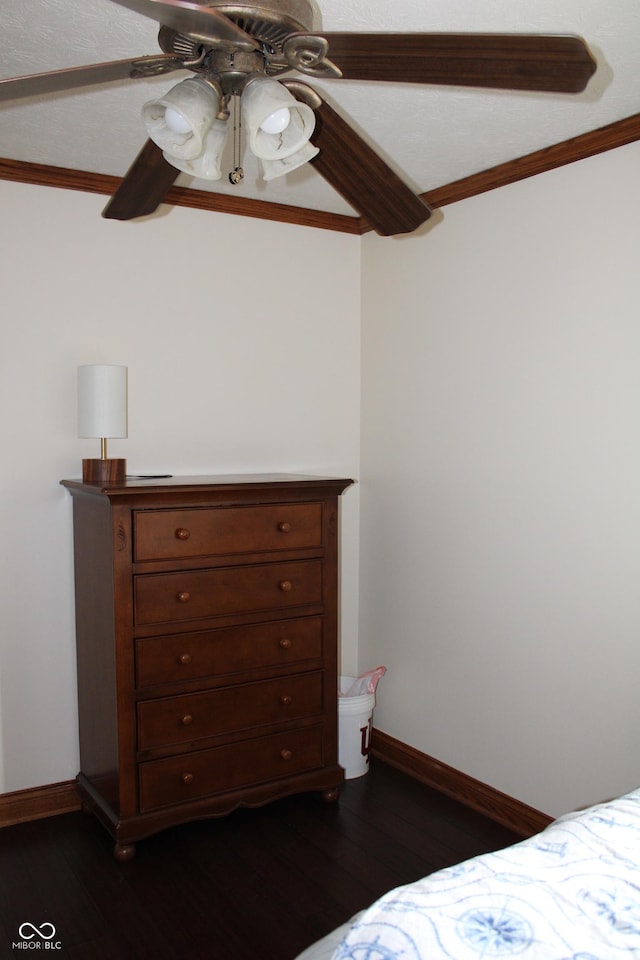 6022 S 550th Rd E, Franklin, IN 46131 - bedroom featuring crown molding, dark wood-style floors, and a ceiling fan