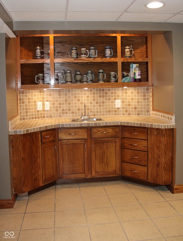 6022 S 550th Rd E, Franklin, IN 46131 - indoor wet bar featuring backsplash, light tile patterned flooring, and recessed lighting