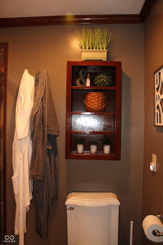 6022 S 550th Rd E, Franklin, IN 46131 - half bathroom featuring toilet and crown molding
