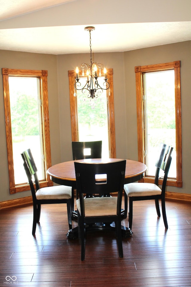 6022 S 550th Rd E, Franklin, IN 46131 - dining space with a chandelier, plenty of natural light, and dark wood-type flooring
