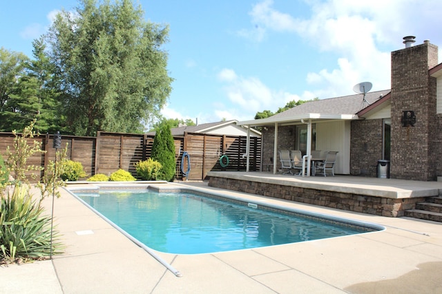 6022 S 550th Rd E, Franklin, IN 46131 - view of pool featuring a patio and a fenced backyard