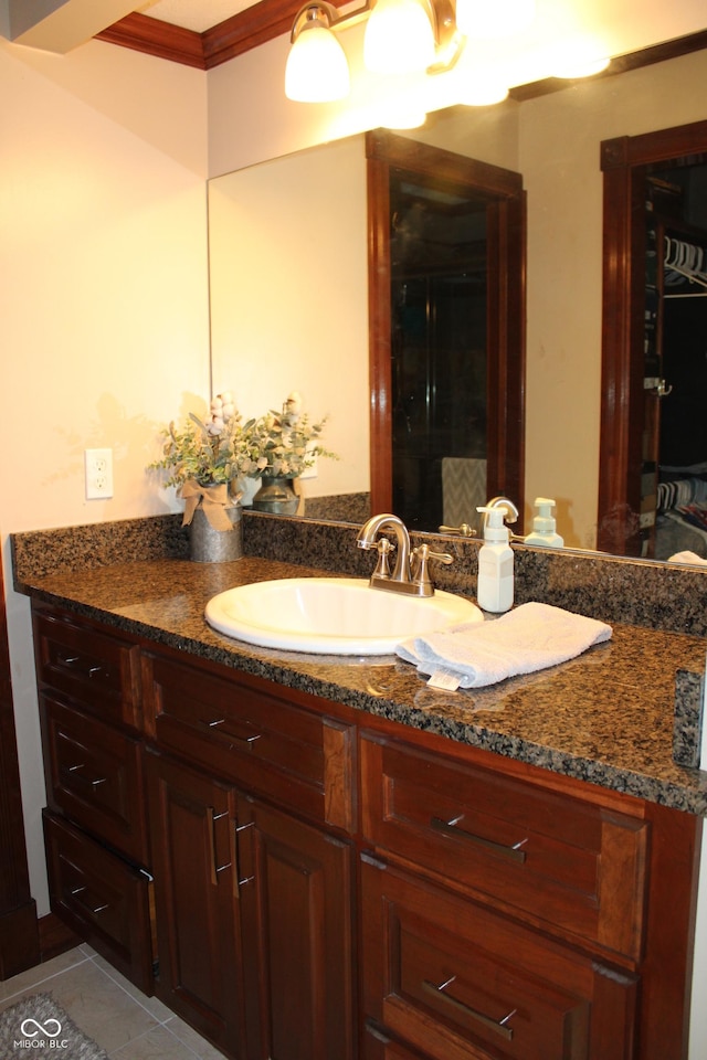 6022 S 550th Rd E, Franklin, IN 46131 - bathroom featuring vanity, ornamental molding, and tile patterned floors