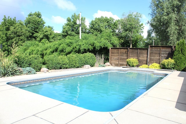 6022 S 550th Rd E, Franklin, IN 46131 - swimming pool featuring view of scattered trees