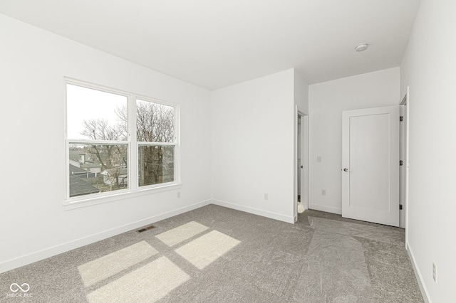 2416 Winthrop Ave, Indianapolis, IN 46205 - empty room with carpet floors and baseboards