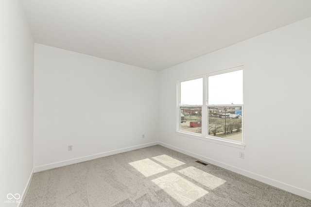 2416 Winthrop Ave, Indianapolis, IN 46205 - carpeted spare room with baseboards