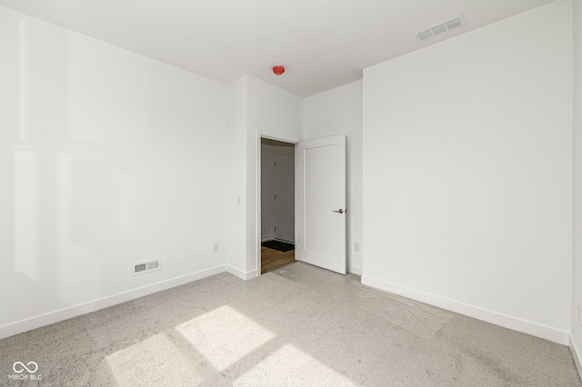 2416 Winthrop Ave, Indianapolis, IN 46205 - carpeted empty room featuring baseboards
