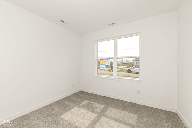 2416 Winthrop Ave, Indianapolis, IN 46205 - carpeted empty room featuring baseboards