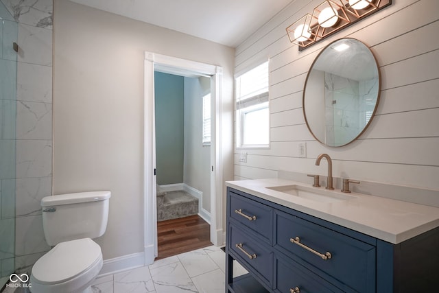 1409 Terrace Ave, Indianapolis, IN 46203 - bathroom with marble finish flooring, vanity, and wooden walls