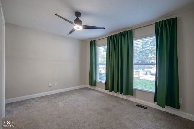 1409 Terrace Ave, Indianapolis, IN 46203 - unfurnished room with a ceiling fan and carpet flooring