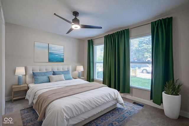 1409 Terrace Ave, Indianapolis, IN 46203 - bedroom featuring multiple windows, carpet, and ceiling fan
