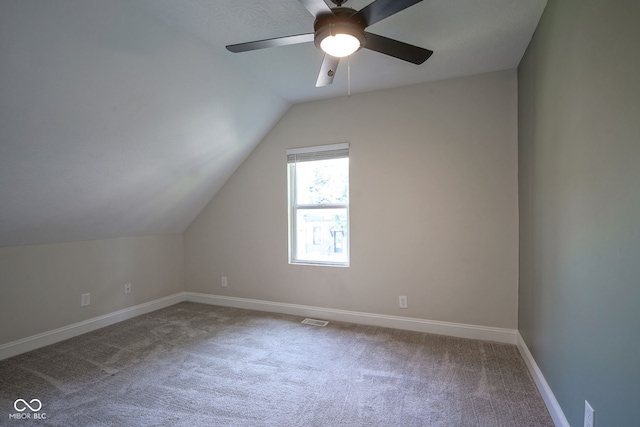 1409 Terrace Ave, Indianapolis, IN 46203 - additional living space with lofted ceiling, carpet, and ceiling fan
