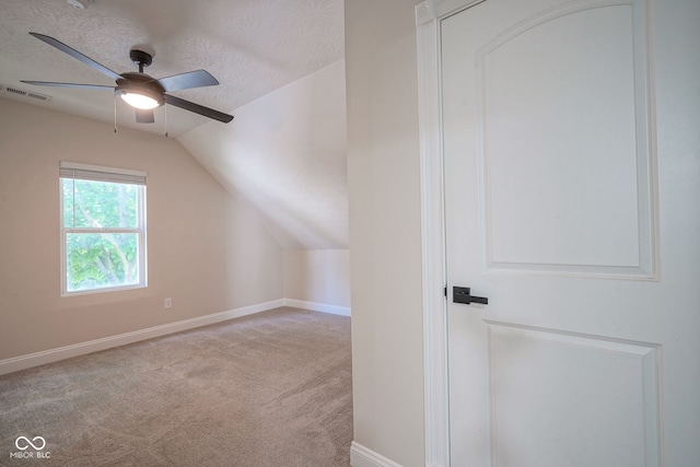1409 Terrace Ave, Indianapolis, IN 46203 - bonus room with ceiling fan, vaulted ceiling, carpet floors, and a textured ceiling