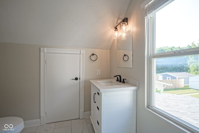 1409 Terrace Ave, Indianapolis, IN 46203 - bathroom with vanity and marble look tile flooring