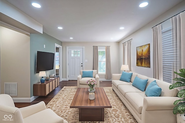 1409 Terrace Ave, Indianapolis, IN 46203 - living area with dark wood-style flooring and recessed lighting