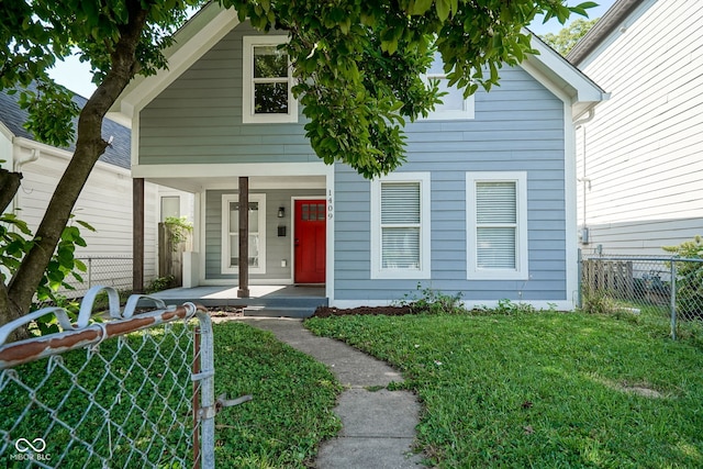 1409 Terrace Ave, Indianapolis, IN 46203 - shotgun-style home with a porch