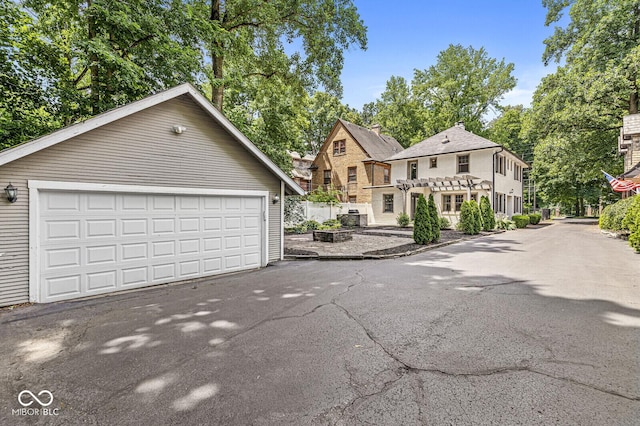 4123 N Illinois St, Indianapolis, IN 46208 - view of front of home featuring an outdoor structure and a garage
