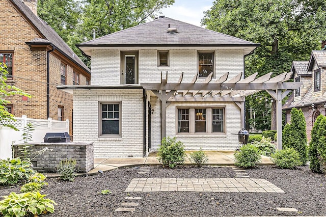 4123 N Illinois St, Indianapolis, IN 46208 - rear view of property with an outdoor kitchen, brick siding, a patio, and a pergola