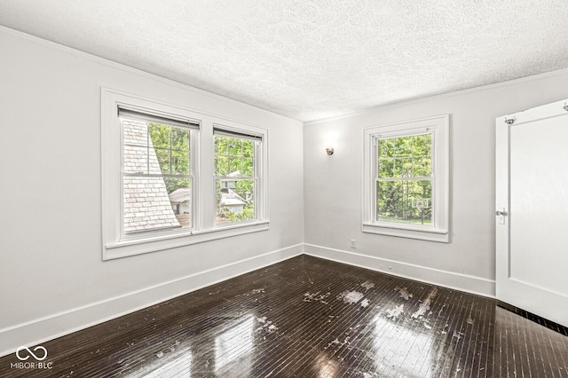4123 N Illinois St, Indianapolis, IN 46208 - unfurnished room featuring crown molding, a textured ceiling, and dark wood finished floors