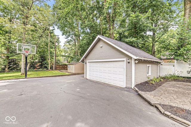 4123 N Illinois St, Indianapolis, IN 46208 - detached garage featuring view of scattered trees and a shed