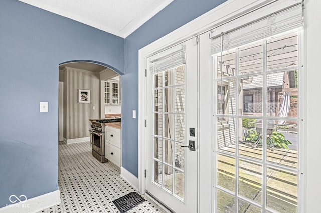 4123 N Illinois St, Indianapolis, IN 46208 - doorway featuring arched walkways, light floors, and french doors