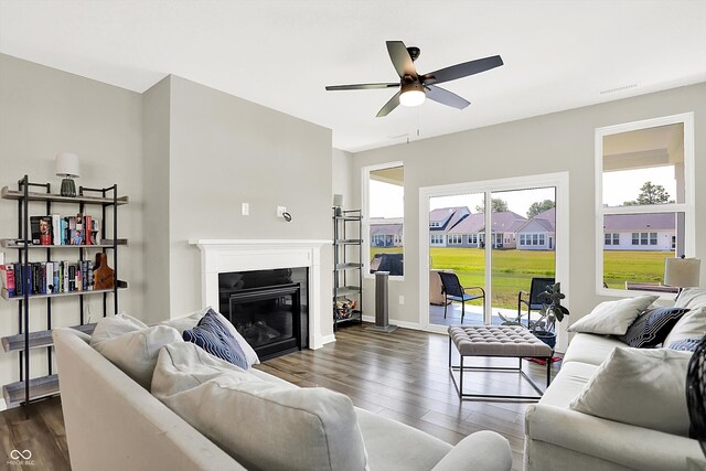 887 Tuxedo Dr, Westfield, IN 46074 - living room with dark wood-style flooring, ceiling fan, and a glass covered fireplace