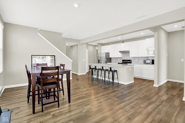 887 Tuxedo Dr, Westfield, IN 46074 - dining room featuring wood finished floors and recessed lighting