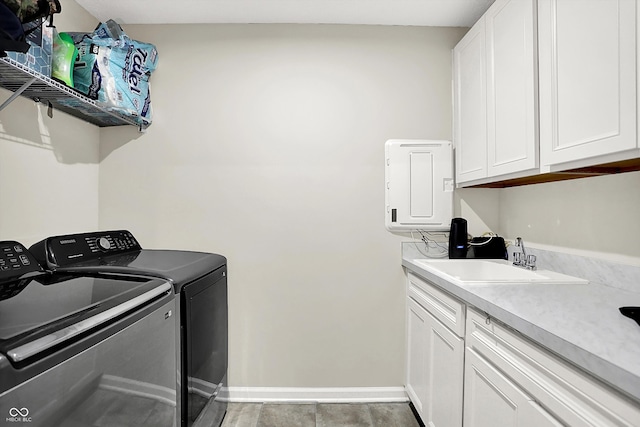 887 Tuxedo Dr, Westfield, IN 46074 - laundry room with washing machine and clothes dryer, cabinet space, and tile patterned floors