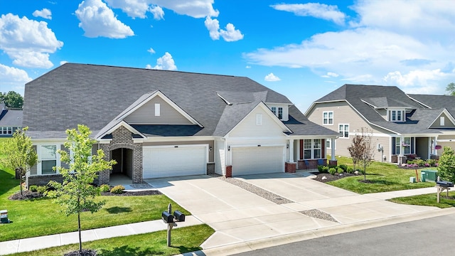 887 Tuxedo Dr, Westfield, IN 46074 - view of front of home featuring brick siding, a front lawn, concrete driveway, and a garage